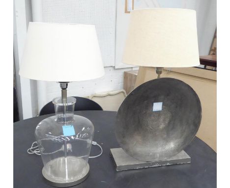 OKA GLASS JAR TABLE LAMP, 77cm H with a shade and an Oka table lamp with a circular dish design to the front and a shade, 83c