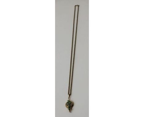 A 14k pendant set five polished jade stones, mounted on a yellow metal chain, 23g