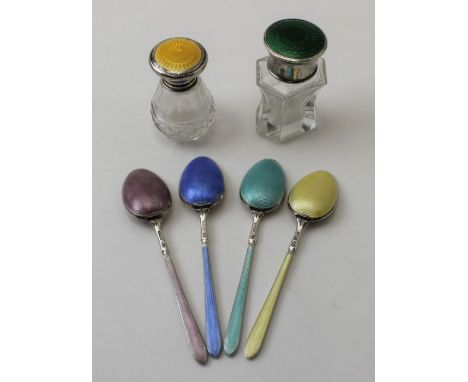 Two glass scent bottles, having silver &amp; enamel tops, one green, one yellow, and a harlequin set of four silver &amp; ena