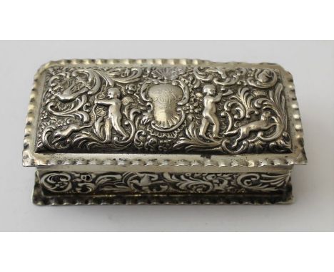 Goldsmiths & Silversmiths Co. A Victorian rectangular silver box, embossed putti decoration, London 1901, 10cm x 5cm, weight: