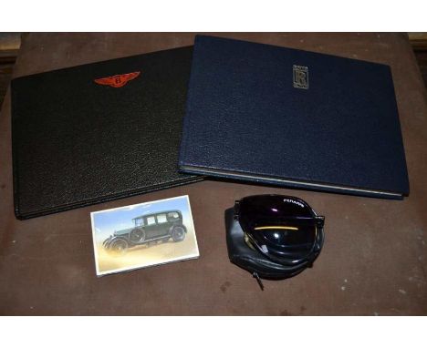 Rolls Royce centenary album with stuck in cards a similar album for Bentley motors cards yet to be added and a pair of Ferrar