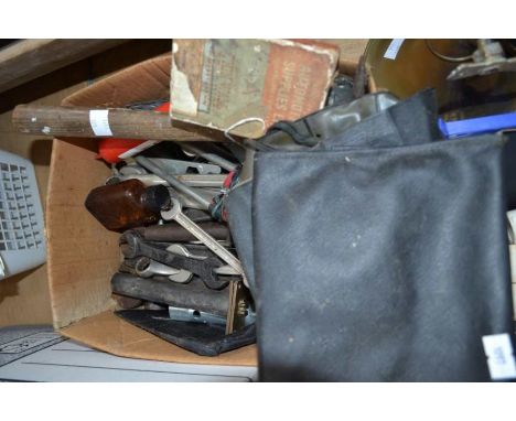 A small box of vintage car hand tools including tool rolls