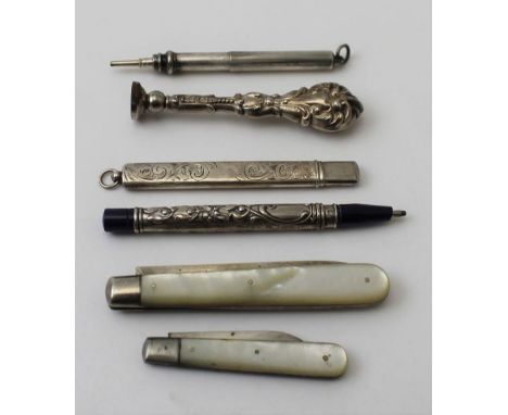 Two mother-of-pearl and silver folding fruit knives, 1884 and 1930, three silver mounted pencils, and a silver handled desk s