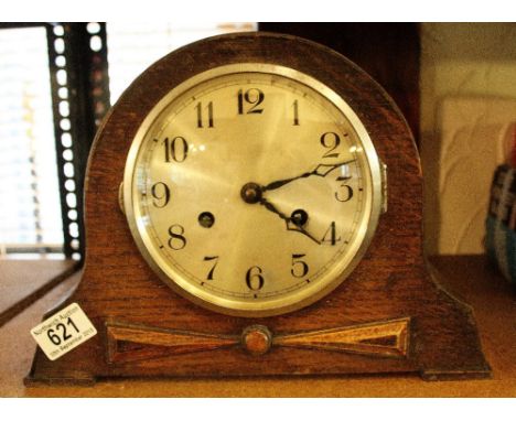 Oak cased chiming mantel clock 