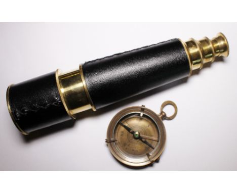 Brass compass and a brass telescope 