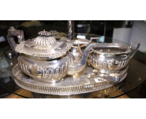 Five piece silver plated tea service including tray and sugar tongs