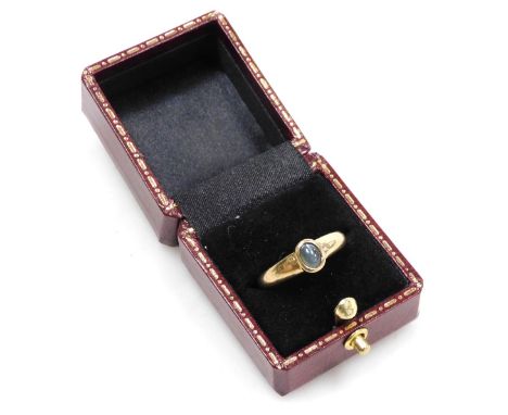 A 9ct gold and cabochon agate solitaire ring, size N, 3.1g.  