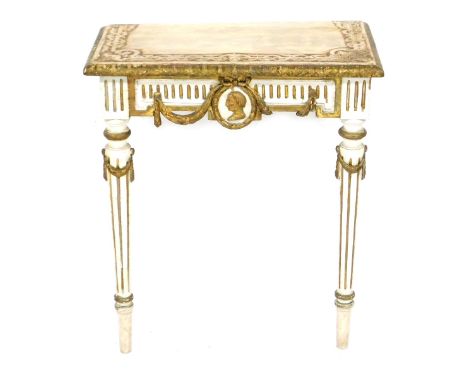 A 19thC Continental Neo Classical gilded and white painted console table, foliate carved rectangular top, above a frieze carv