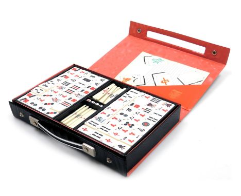 An Argon Mahjong set, cased with instructions.