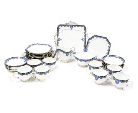 An early 20thC Royal Paragon porcelain Vase pattern part tea service, comprising pair of bread plates, cream jug and sugar bo