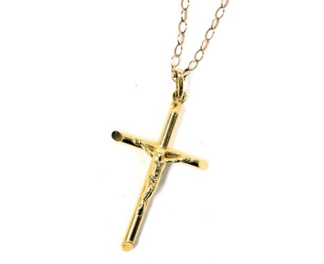 A 9ct gold crucifix pendant, on a belcher link neck chain, with bolt ring clasp, stamped 9ct, 6.9g all in.