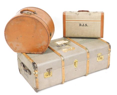 An early 20thC Vulca-fibrex tan leather hat box or vanity case, containing three hats, 46cm wide, wooden bound canvas cabin t