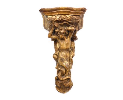 A late 18thC gilt wood wall bracket, the serpentine shelf above a carved figure of a Triton, shell capped, 35cm high.