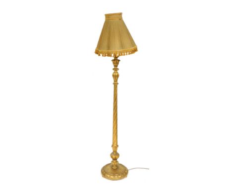 A Victorian gilt wood standard lamp, of carved and fluted form, with shade, 172cm high.