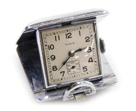 An early 20thC Suizex chrome cased travel clock, the square silvered dial bearing Arabic numerals, subsidiary seconds dial, t
