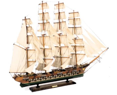 A wooden scale model of the 18thC sailing ship Fargata, fully rigged with sails, on a named base, 79cm high, 106cm wide.