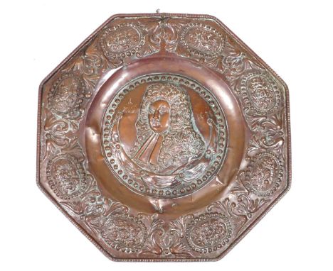 A 19thC copper wall plaque, of octagonal form, embossed centrally with a bust portrait of King Louis XIV 1686, in a border em