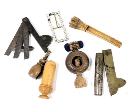 Two early 20thC brass and steel blood letting fleams, turned wooden sewing accoutrements, a seal, treen nut cracker, paste bu