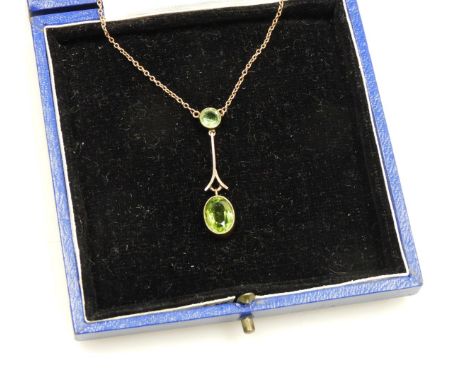 An Edwardian peridot drop pendant, in yellow metal stamped 9ct, on a belcher link neck chain, with bolt ring clasp, 4g all in