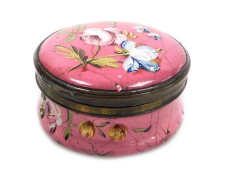A late 18thC Bilston enamel snuff box, of cylindrical form, decorated with floral sprays, on a rose pink ground, 50mm diamete