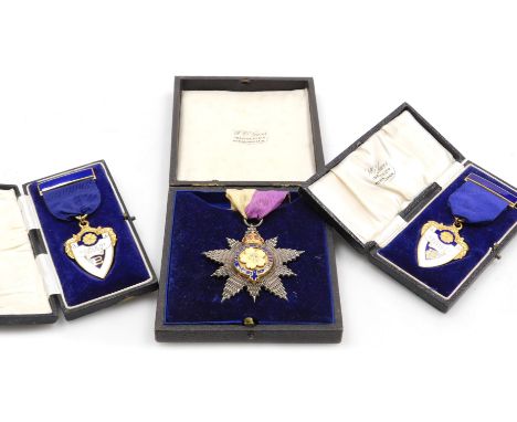 A silver gilt and enamel Order of The Primrose League, with a yellow and purple neck ribbon, together with two Primrose Leagu