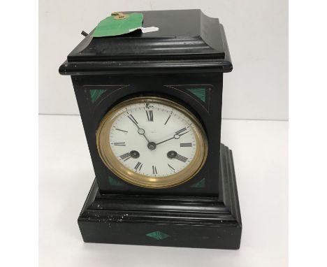 A Victorian black slate mantel clock with malachite decoration, the white enamel dial set with Roman numerals and inscribed i