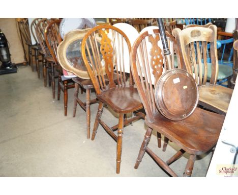 Four oak stick and wheel back chairs AF