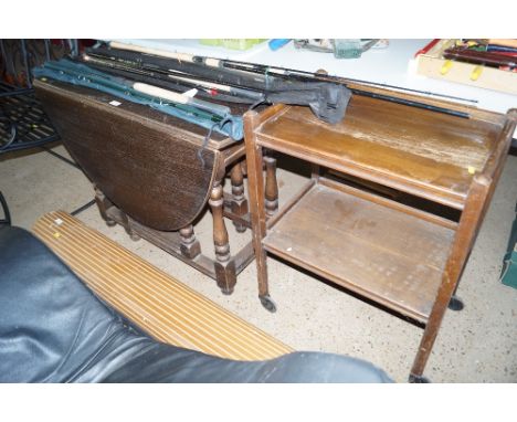 An oak gate leg table together with a two tier trolley