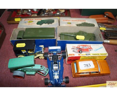 A quantity of diecast vehicles to include a boxed Dinky tank number 651; a boxed Dinky 10 ton army trunk number 622; a boxed 