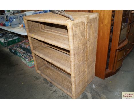 Two wicker shelf units