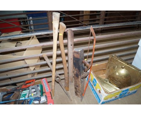 A large wood plane together with a hand saw; together with  a pick axe and an axe handle