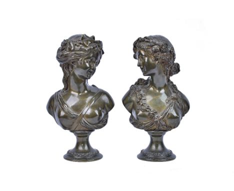 A pair of patinated bronze busts, 19th century, each depicting a classical lady on a socle, one signed 'Marin', the other 'L.