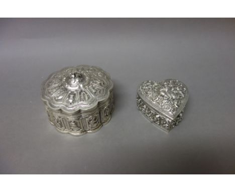 Eastern wares, comprising; a shaped circular box and cover, the panels to the body decorated with figures, animals and fish, 