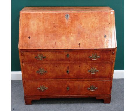 An 18th century Continental mahogany bureau with fitted interior over three long graduated drawers, bracket feet, 108cm wide 