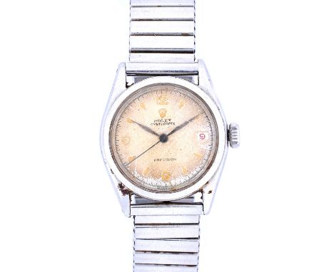 A Rolex Oysterdate steel circular cased gentleman's wristwatch, the signed silvered dial with gilt Arabic and arrow shaped nu