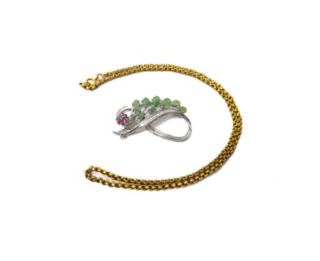 A gold, diamond, ruby and green gem set brooch, designed as a spray, detailed 750 and a gold circular link neckchain, detaile