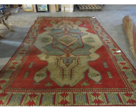 A Turkish carpet, 340cm x 218cm.