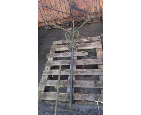 An early 20th century cast iron weather vane in the style of a horse, 109cm wide x 213cm high.  OUT