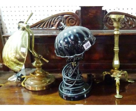 A 20th century black painted desk lamp with shell shade, another similar and a brass candlestick lamp, (3).   E9