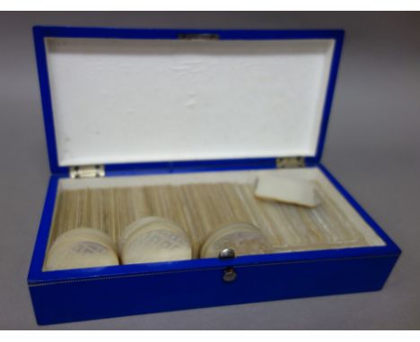 A group of Chinese export mother- of-pearl gaming counters, 19th century, comprising; a number of long rectangular bracket ed