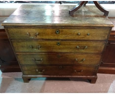 A George III oak chest of drawers with four long drawers on bracket feet, 92cm wide x 86cm high.  C5