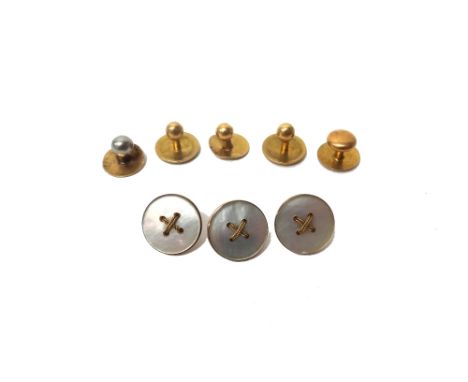 A pair of gold studs, detailed '18', three further gold studs and three gold mounted mother-of-pearl dress buttons, detailed 