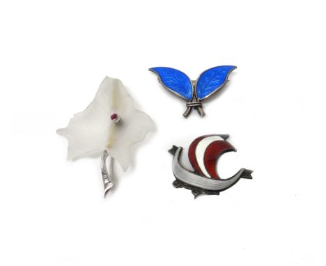 A ruby and diamond set frosted rock crystal brooch, designed as an ivy leaf, mounted with a cushion shaped ruby and with thre
