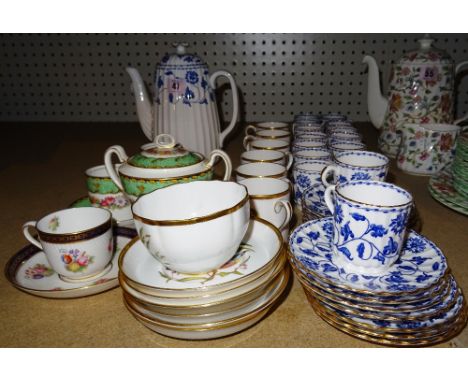 A Spode part tea service, together with a group of Spode cups and saucers, decorated with individual songbirds and an Aynsley