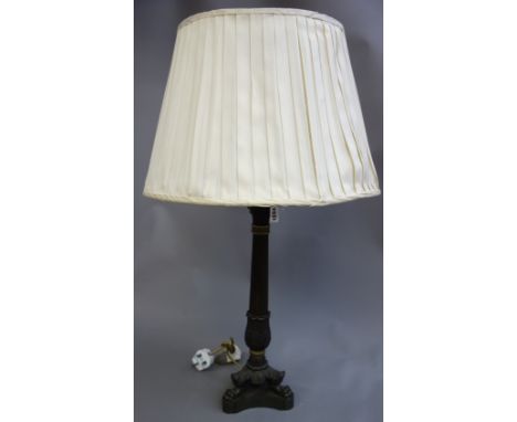 A Victorian style bronze table lamp of fluted column form, on lion paw feet and triform base, and a painted octagonal table l