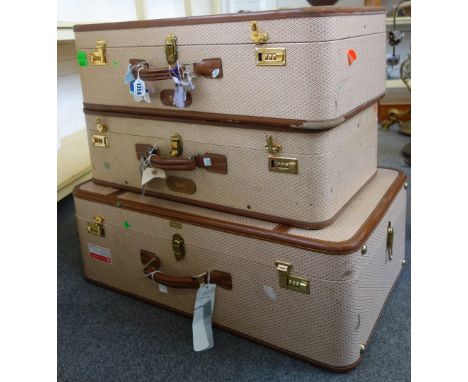 A set of three vintage style suitcases, by T. Anthony Ltd, the largest 83cm wide, (3).
