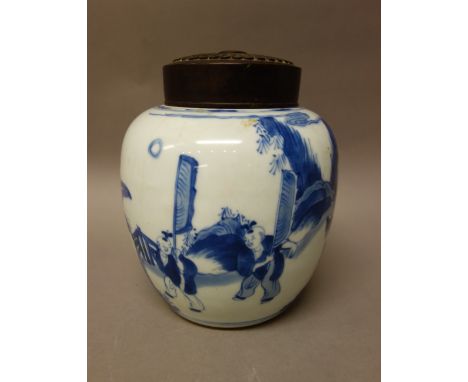 A Chinese blue and white oviform jar, Kangxi, painted with a procession of boys leading a figure riding a mythical beast, 17c