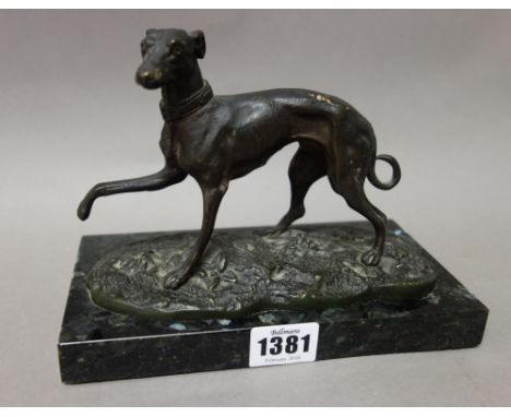 After Pierre-Jules Mêne; a French patinated model of a greyhound on a naturalistic base and polished granite plinth, 20cm wid