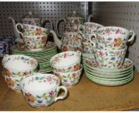 A Minton tea and coffee service, decorated with Haddon Hall pattern, (qty).