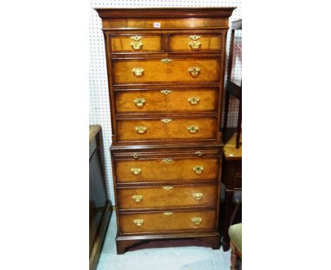 A 20th century walnut crossbanded tallboy of two short and six long drawers, on bracket feet, 71cm wide x 162cm high.  B9